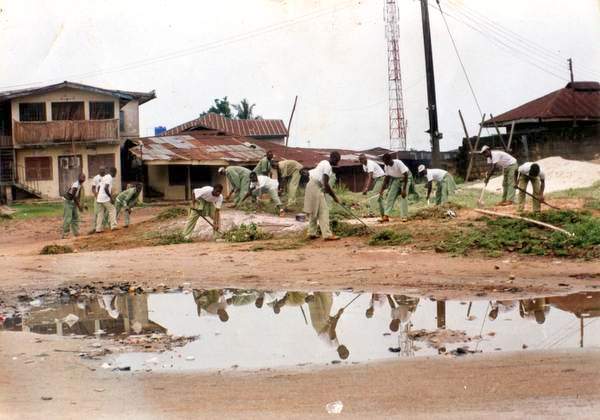 Cleaning up a marketplace in Lagos, Nigeria.