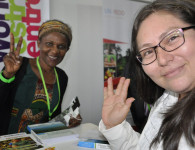 Blog writer Daisy Ouya and guest at the ICRAF booth at GLF. Photo: ICRAF