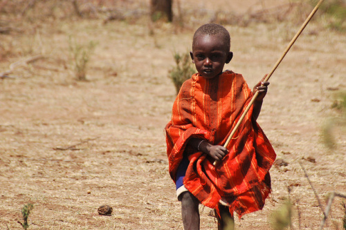 A Maasai child, Kenya. Maasai pastoralists in East Africa increasingly find their traditional herding routes blocked by land investors. Photo: Tim Cronin/CIFOR photo